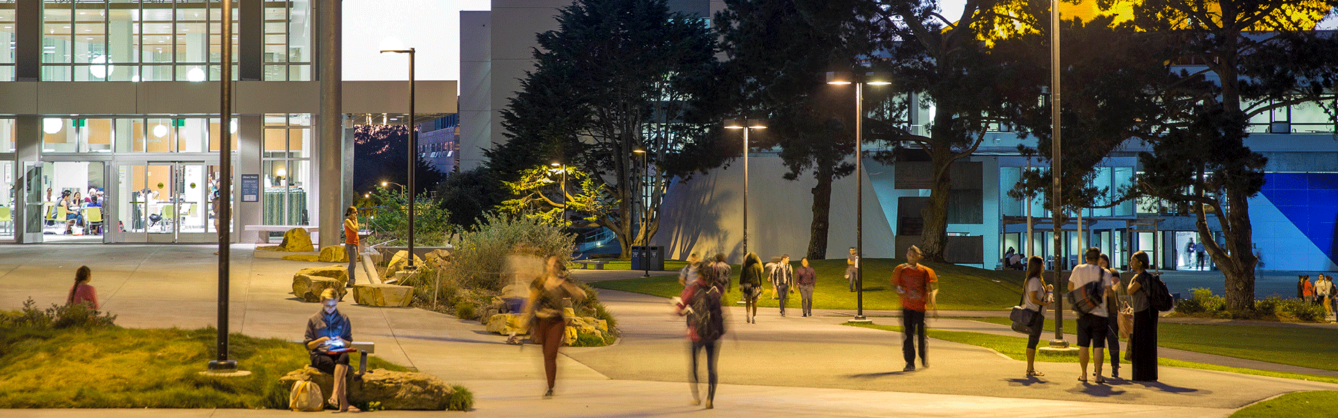 Students walking on campus at night